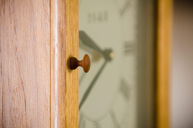 Turned knob on the Isaac Youngs Shaker Wall Clock 