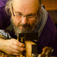 Bill Anderson repairing a rabbet plane with a try square and hand plane