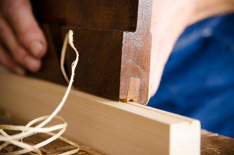 Using a beading plane to cut a bead on wood