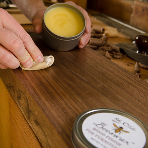 Ye Olde Beeswax Wood Finish applied to a walnut board