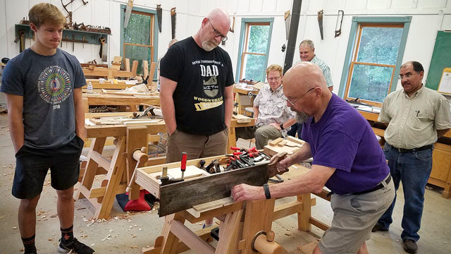 Bill Anderson teaching a hand tool woodworking class on making workbench fixtures