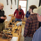 Bill Anderson teaching students about handplanes in a woodworking class