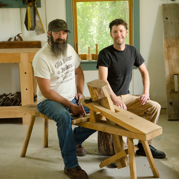 Ervin and Willie Ellis brothers teaching a wodworking class to build a German shaving horse