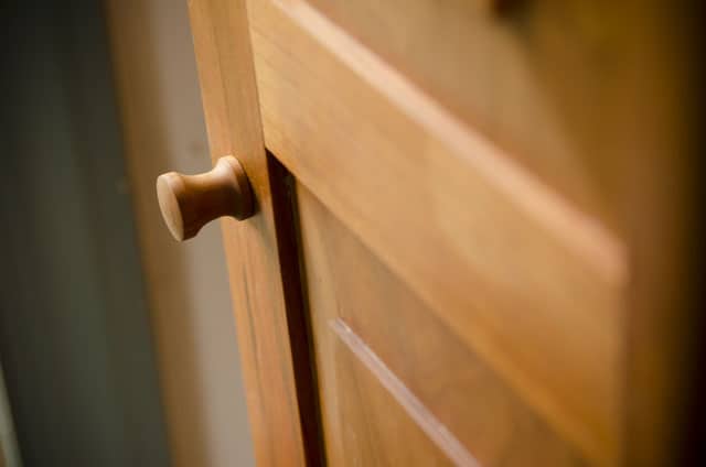 turned knob of a Cherry shaker wall cupboard