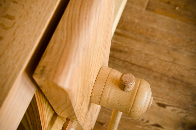 A portable Moravian Workbench wooden screw leg vise