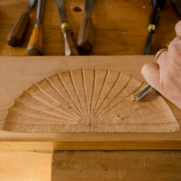 David Ray Pine wood carving a fan carving in a piece of cherry wood for a carving class