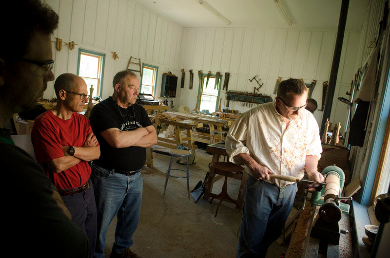 Will Myers demonstrating woodturning to students at Joshua Farnsworth's Wood And Shop Traditional Woodworking School