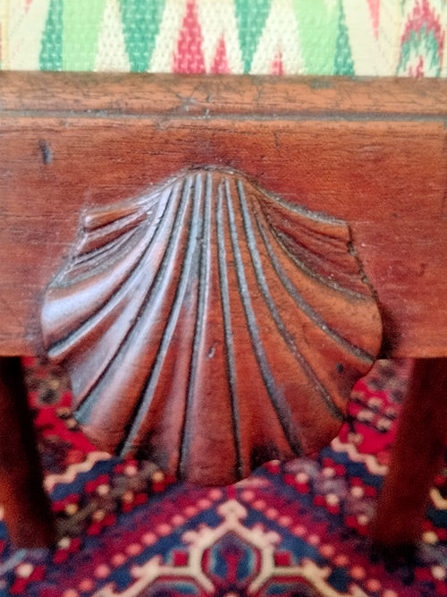 Carved Philadelphia shell on a chair by Wood Carver Kaare Loftheim